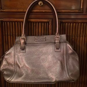 Darling pewter color pebbled leather Kate Spade handbag. 9 x 15”w.